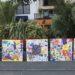 Islanders’ artwork brightens hotel hoarding