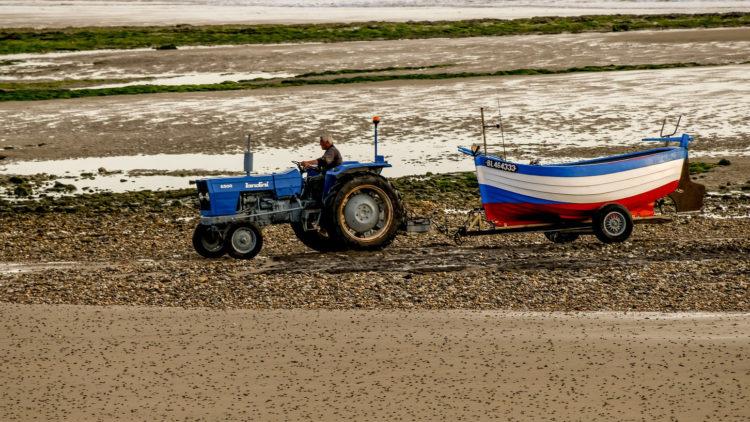 Tractor boat trailer beach