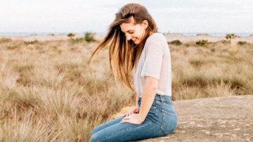 Girl sitting smiling