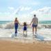 Parents child beach adoption