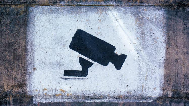 CCTV security camera sign graffiti