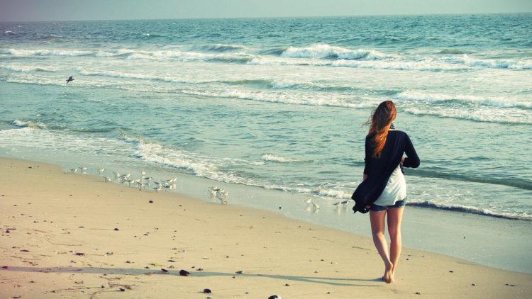Girl beach walking
