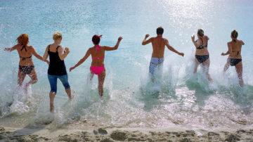 Group beach splash sea