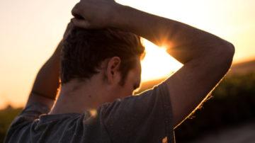 Man hands on head