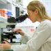 National Cancer Institute woman microscope