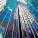 Office building reflections sky clouds