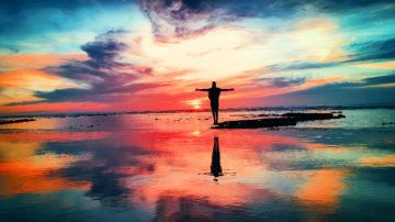Sea red sky arms outstretched