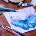 Artist painting butterfly