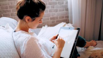 Girl using iPad tablet