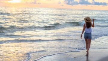 Girl walking beach