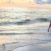 Girl walking beach