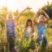 Girls in field flowers