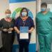 HSC Vice President Deputy Tina Bury presenting the HSC President's Award to the Scheduling and Testing Team 2022-03