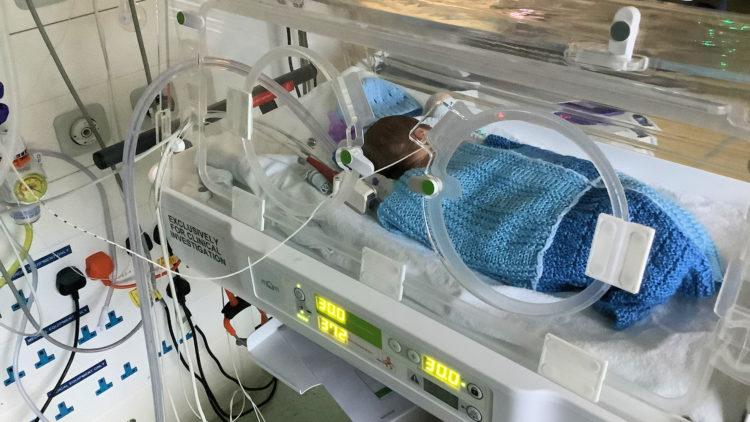 mom premature baby incubator