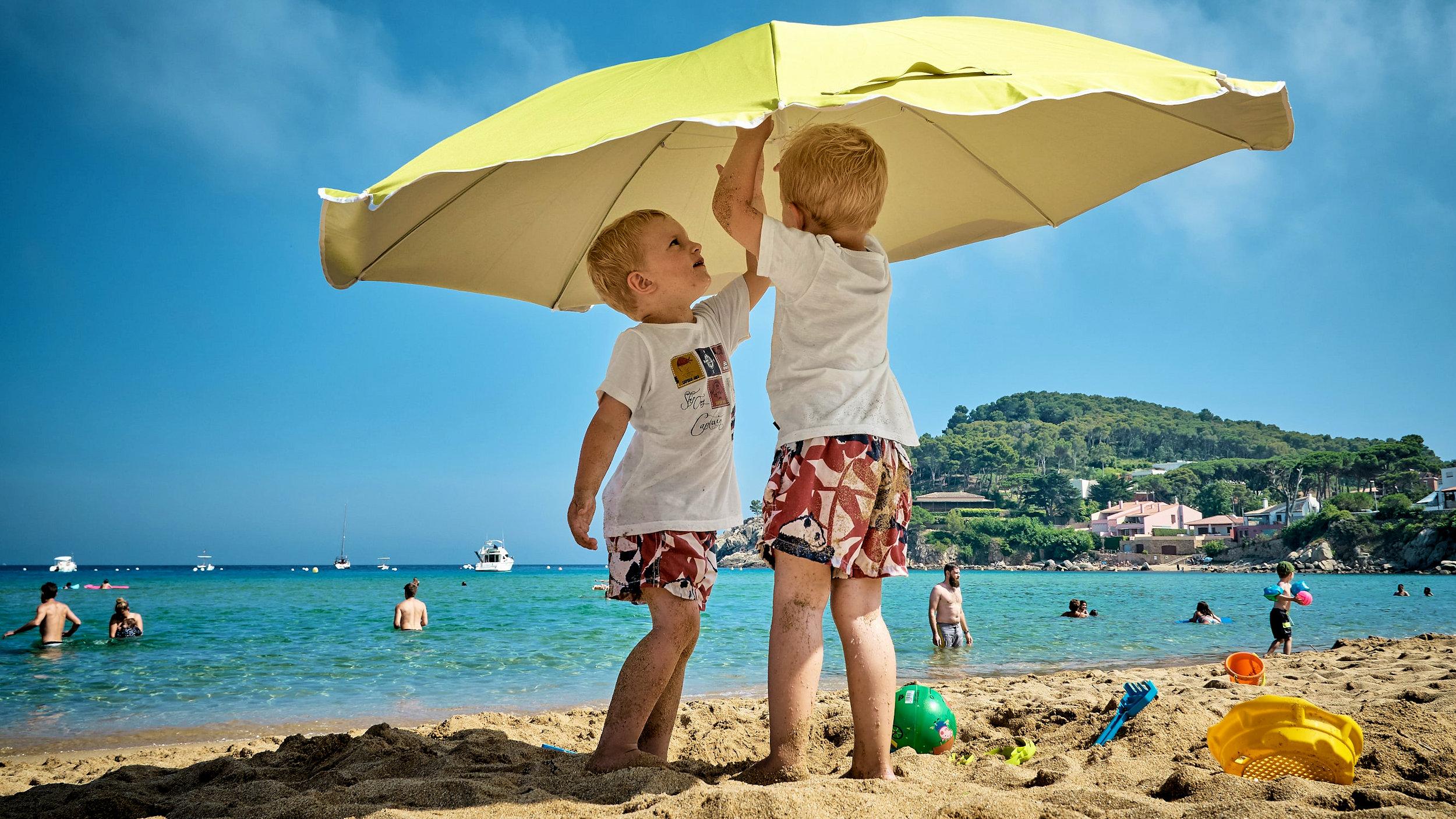 Children beach sun sunshade umbrella