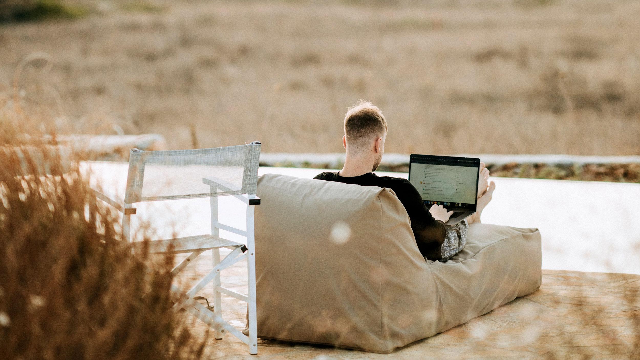 Working on beach laptop