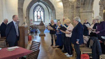 A choir with a difference is visited by the Lieutenant Governor