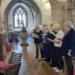 A choir with a difference is visited by the Lieutenant Governor