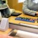 Clerk counting money cash coins bank