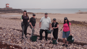 Deloitte in Jersey mark the start of Tortoise Takeover with beach clean