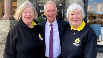 Sara Gould, treasurer at Bowel Cancer Guernsey; Martin Search, director at Ray and Scott; Anne Brouard, chair at Bowel Cancer Guernsey 2024-06 01 16-9
