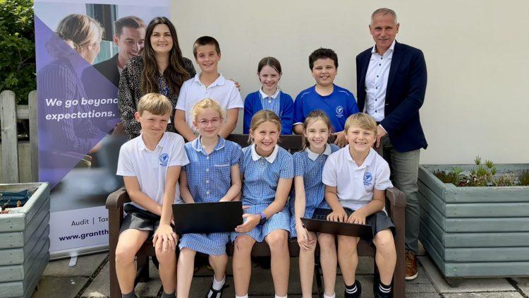 Grant Thornton and IT Hardware Services donate refurbished laptops to local schools in Jersey