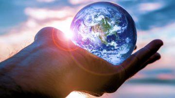 Planet Earth in hand Interesting stories
