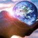 Planet Earth in hand Interesting stories