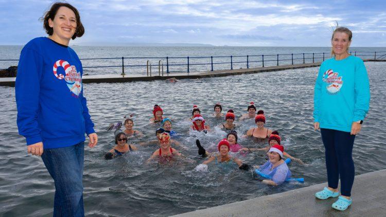 Sea swimmers brave the chill to raise £12,000 for Les Bourgs