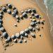 News from around the World - Granite heart on beach