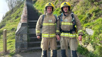 Guernsey Firefighters take on the Saffery Rotary Walk in full firefighting kit challenge