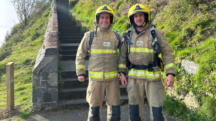 Guernsey Firefighters take on the Saffery Rotary Walk in full firefighting kit challenge